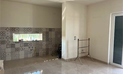 Trilocale con terrazzo e posto auto